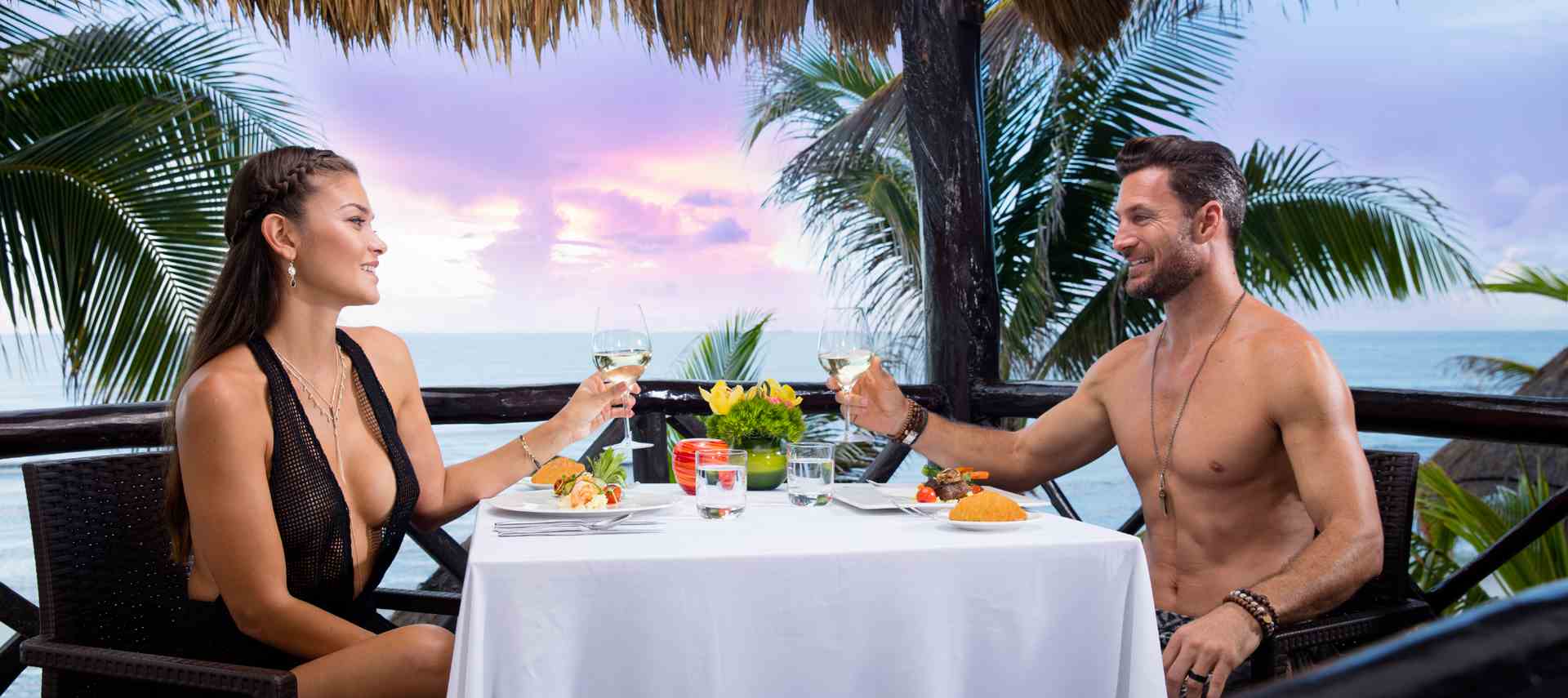 Romantic couple dining at the nudist all inclusive resort | Hidden Beach | Mexico